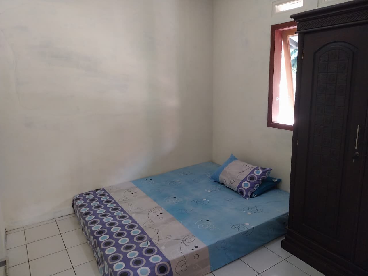 Kamar tidur Homestay Bapak Askam