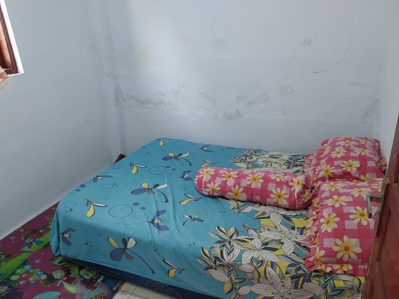 Kamar tidur Homestay Ibu Ita