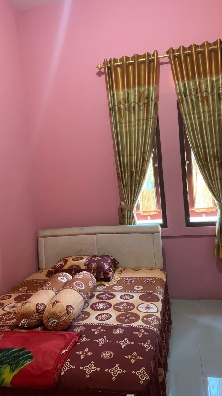 Kamar tidur Homestay Ibu Iyet
